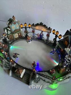 Carole Towne Lawley Village skating rink 8 Christmas songs LED lights Animated